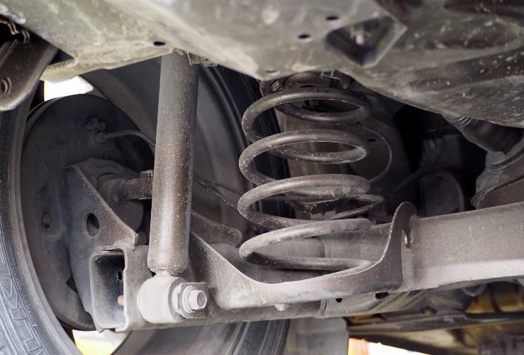 Dirty car shock absorber and spring