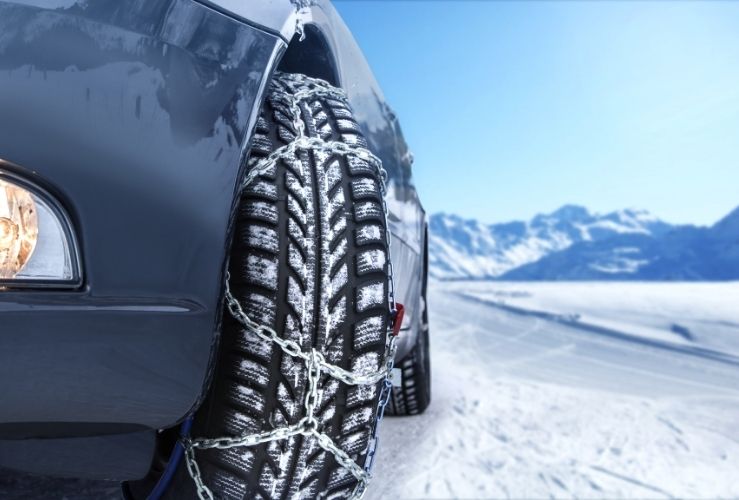 Car fitted with snow chains