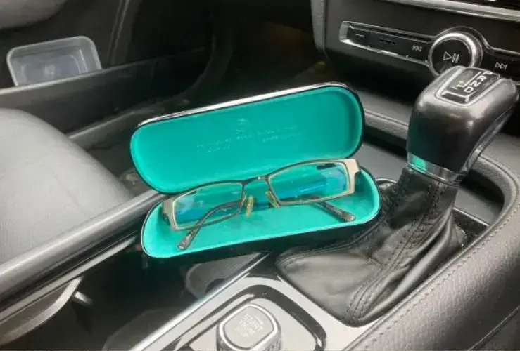 See sense with spare pair of glasses in the car