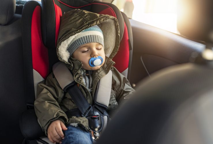 Leaving your child in the car while you get fuel what the law says