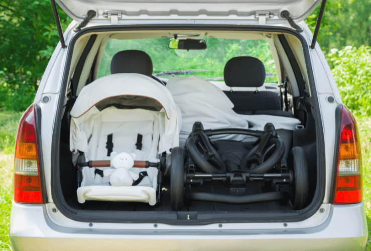 Baby carrier in boot of car