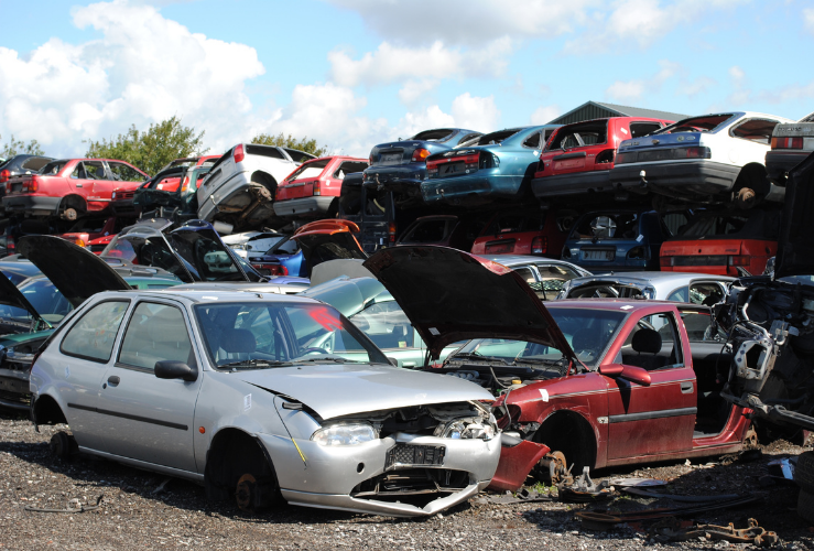 Cars stacked up at scrap yard