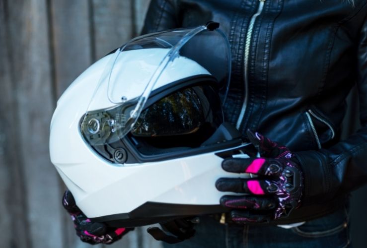 Image of motorcycle helmet, gloves and leathers