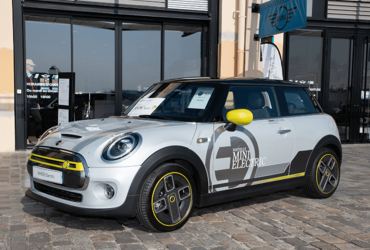 Electric Mini parked outside UK car showroom
