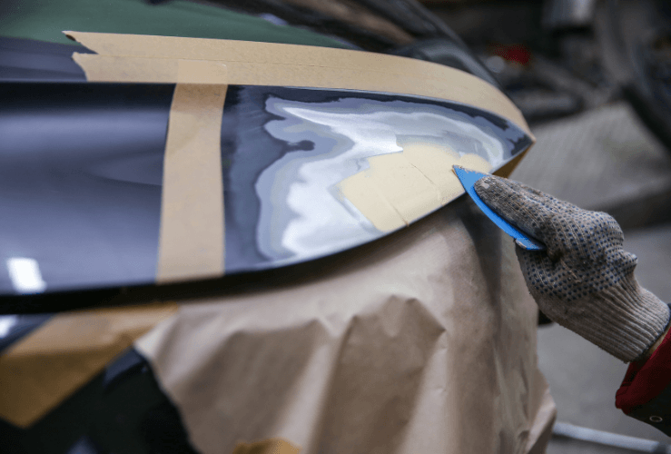 Repairing car body with putty