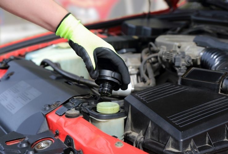 Topping up car steering fluid