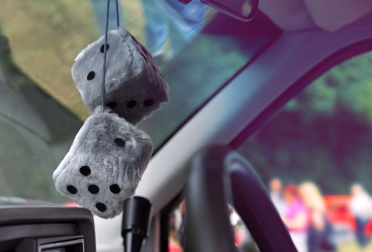 Fluffy dice in car windscreen