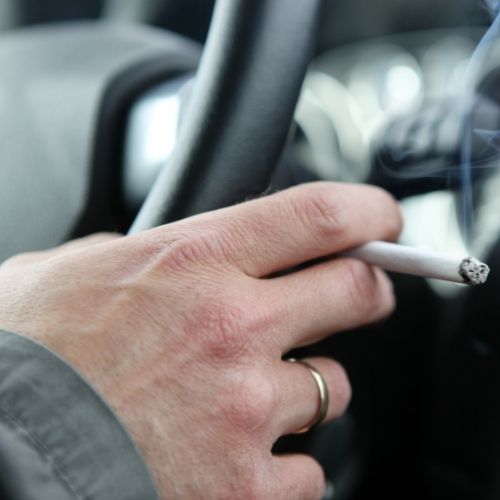 Smoking and driving: Is it illegal?