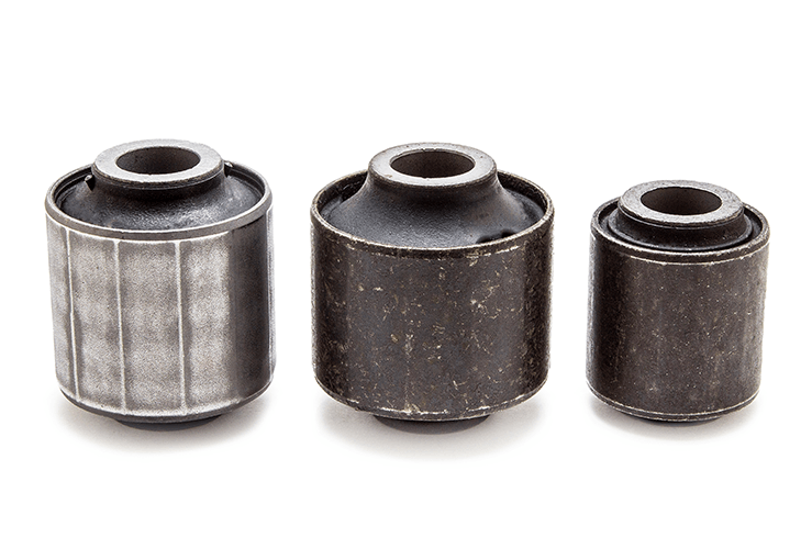 A close up of suspension bushings