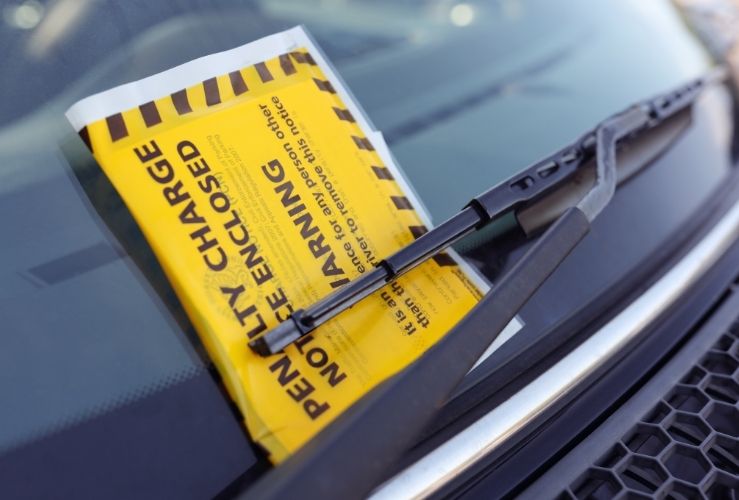 Parking ticket on car windscreen