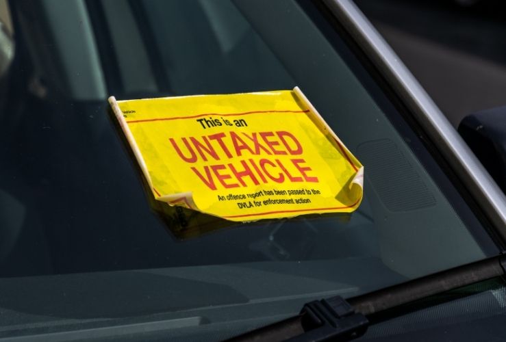 Sticker on window of untaxed car