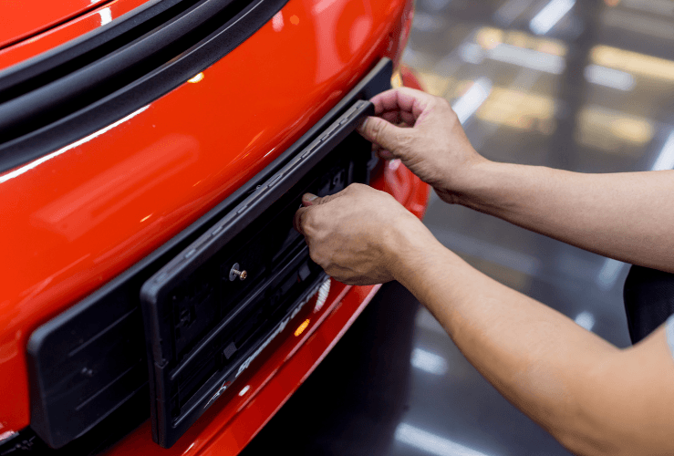 Changing a car number plate
