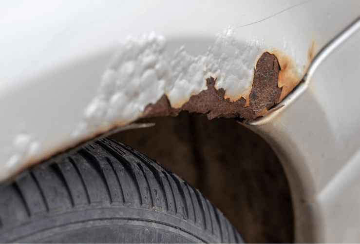 Car with rust on wheel arch