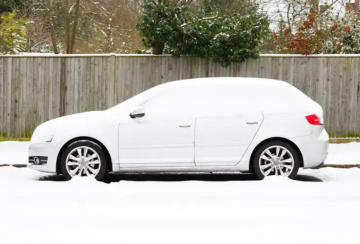 Car covered in snow