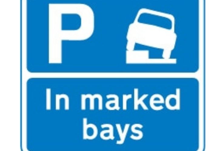 Vehicles may be parked on the verge road sign