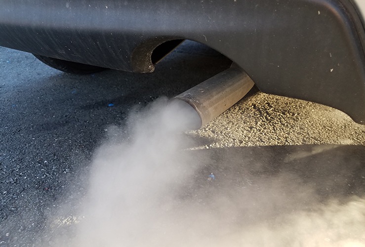car exhaust blowing smoke 